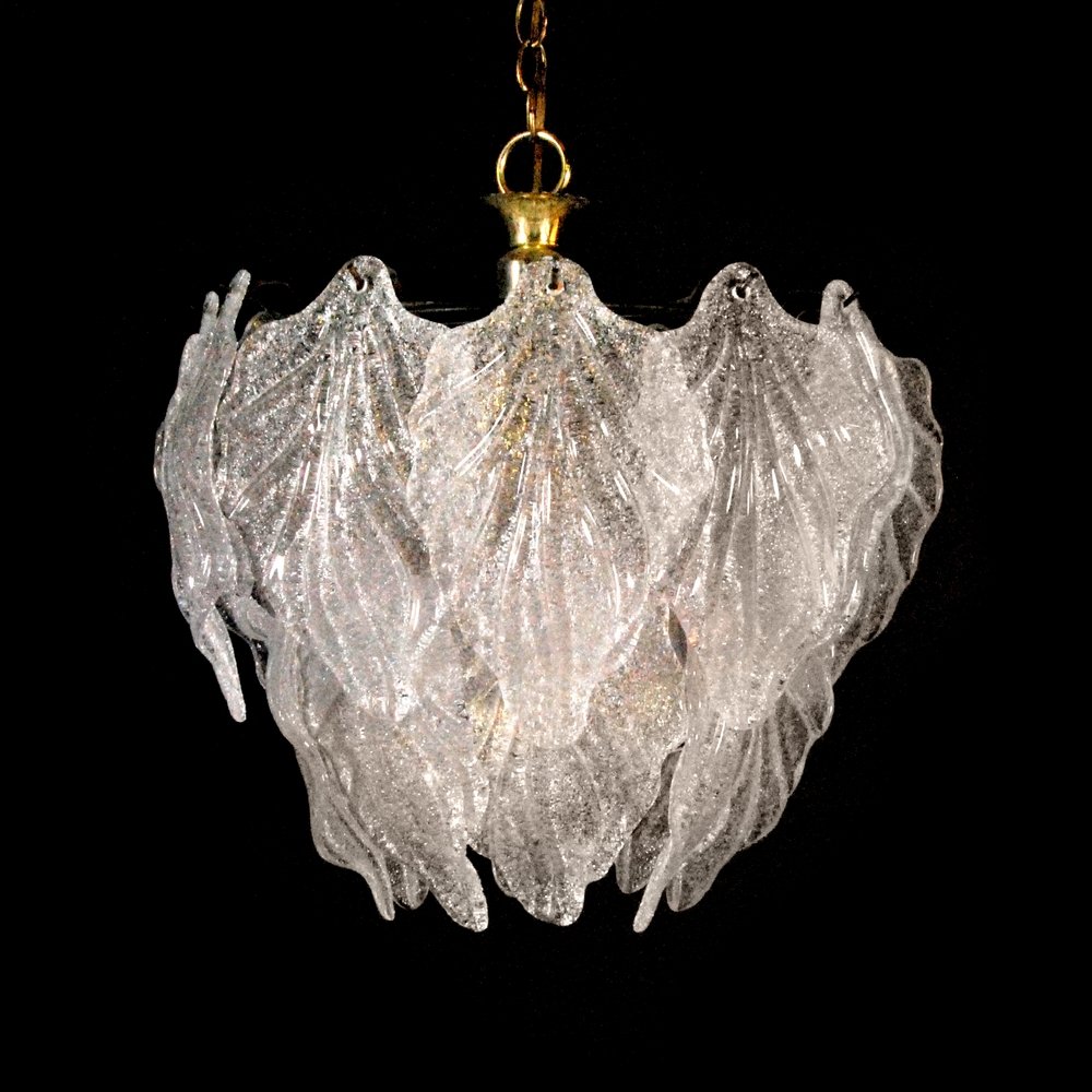 Murano Chandelier, Manner of Barovier & Toso: Designer (Artist) & Manufacturer: Barovier & Toso, Manner of Markings: none Country of Origin & Materials: Italy; glass, brass Additional Information: Tiered chandelier comprised of glass leaves. (Key