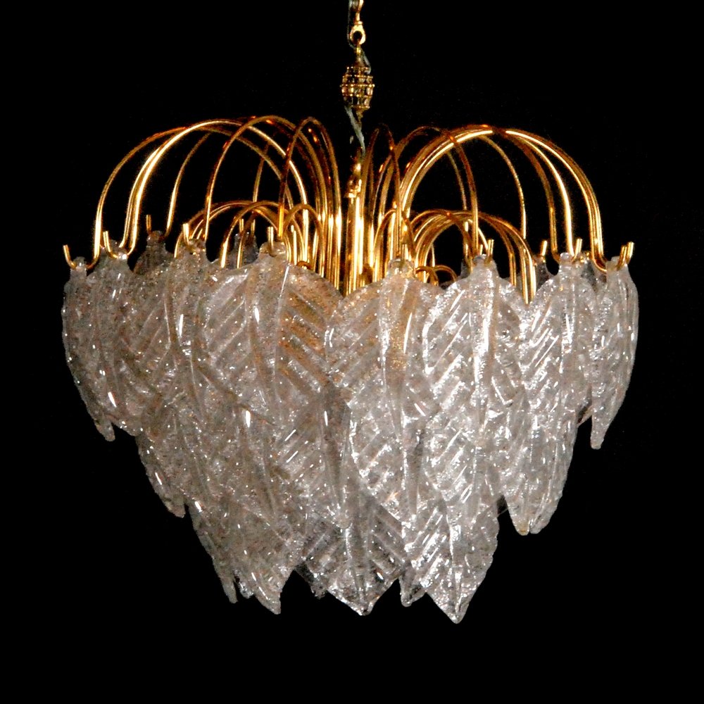 Murano Chandelier, Manner of Barovier & Toso: Designer (Artist) & Manufacturer: Barovier & Toso, Manner of Markings: none Country of Origin & Materials: Italy; glass, metal Additional Information: Tiered chandelier comprised of glass leaves. (Key