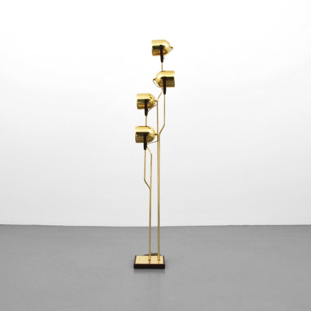 Reggiani Floor Lamp: Designer (Artist) & Manufacturer: Reggiani Markings: none Country of Origin & Materials: Italy; brass Additional Information: Lamp has four adjustable heads. (Key Word Search: Robert Sonneman, Habitat