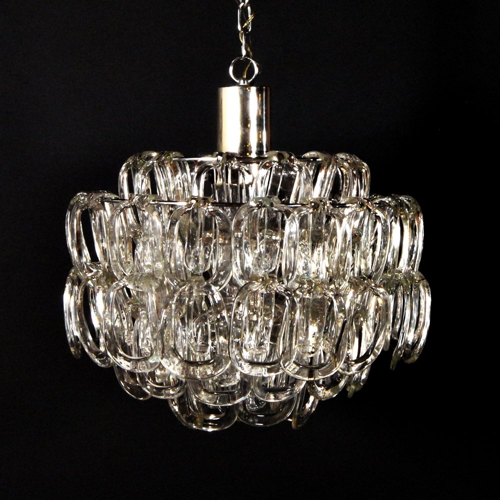 Chandelier Attributed to Angelo Mangiarotti: Designer (Artist) & Manufacturer: Angelo Mangiarotti, Attributed Markings: none Country of Origin & Materials: Italy; glass, chromed metal Additional Information: (Key Word Search: Venini, Barovier & 