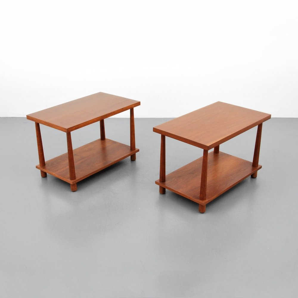 T.H. Robsjohn-Gibbings Side Tables, Pair: Designer (Artist) & Manufacturer: T.H. Robsjohn-Gibbings; Widdicomb Markings: marked Country of Origin & Materials: USA; wood Additional Information: Two-tier tables with reverse-tapered legs. (Key Wo