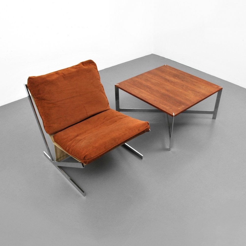 Lounge Chair & Table, Manner of Milo Baughman: Designer (Artist) & Manufacturer: Milo Baughman, Manner of Markings: none Country of Origin & Materials: unknown; chromed metal, upholstery, wood Additional Information: (Key Word Search: Milo Baughma