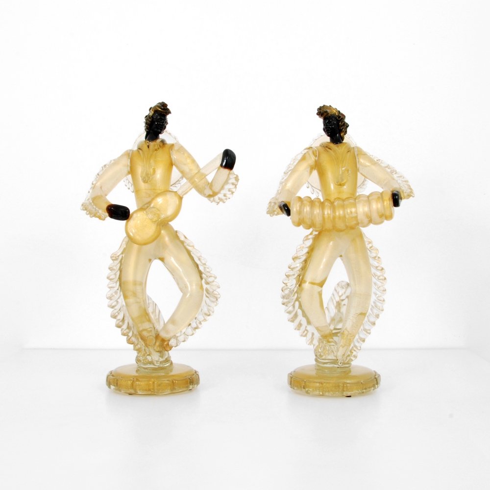Monumental Blackamoor Figurines Attributed to Barovier: Designer (Artist) & Manufacturer: Barovier & Toso, Attributed Markings: none Country of Origin & Materials: Italy; glass Additional Information: Detailed figurines with gold aventurine throughout. (Ke