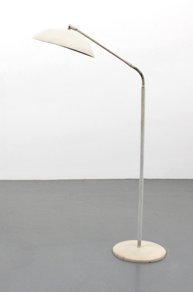 Kurt Versen Adjustable Floor Lamp: Designer (Artist) & Manufacturer: Kurt Versen Markings: none Country of Origin & Materials: USA; metal Additional Information: (Key Word Search: Herman Miller, Knoll, George Nelson, Alexander Girard,