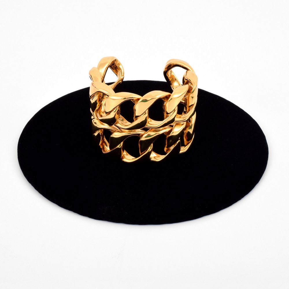 Chanel Gold Tone Cuff: Designer & Manufacturer: Chanel Markings: marked Country of Origin & Materials: France; gold tone metal Additional Information & Circa: (Key Word Search: Alexander Calder, Art Smith, Ed Wiener, Harry
