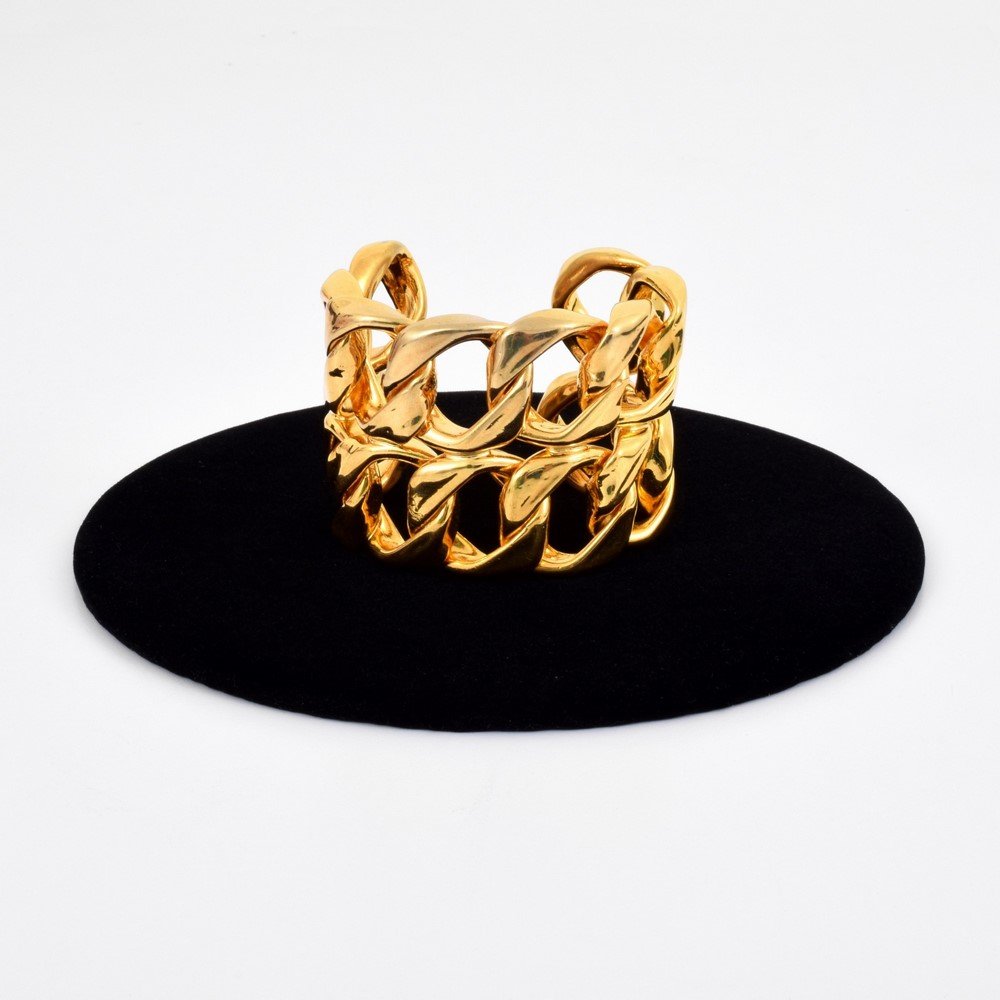 Chanel Gold Tone Cuff: Designer & Manufacturer: Chanel Markings: marked Country of Origin & Materials: France; gold tone metal Additional Information & Circa: (Key Word Search: Alexander Calder, Art Smith, Ed Wiener, Harry