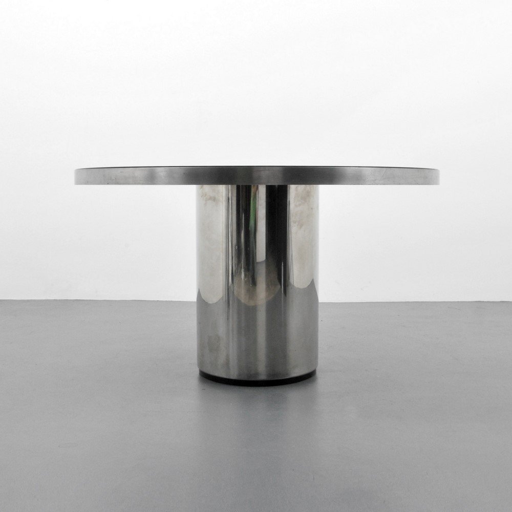 Dining/Center Hall Table, Manner of Brueton: Designer & Manufacturer: Brueton, Manner of Markings: none Country of Origin & Materials: unknown; chromed metal, glass Additional Information & Circa: Table is in the style of Brueton's “Anello”