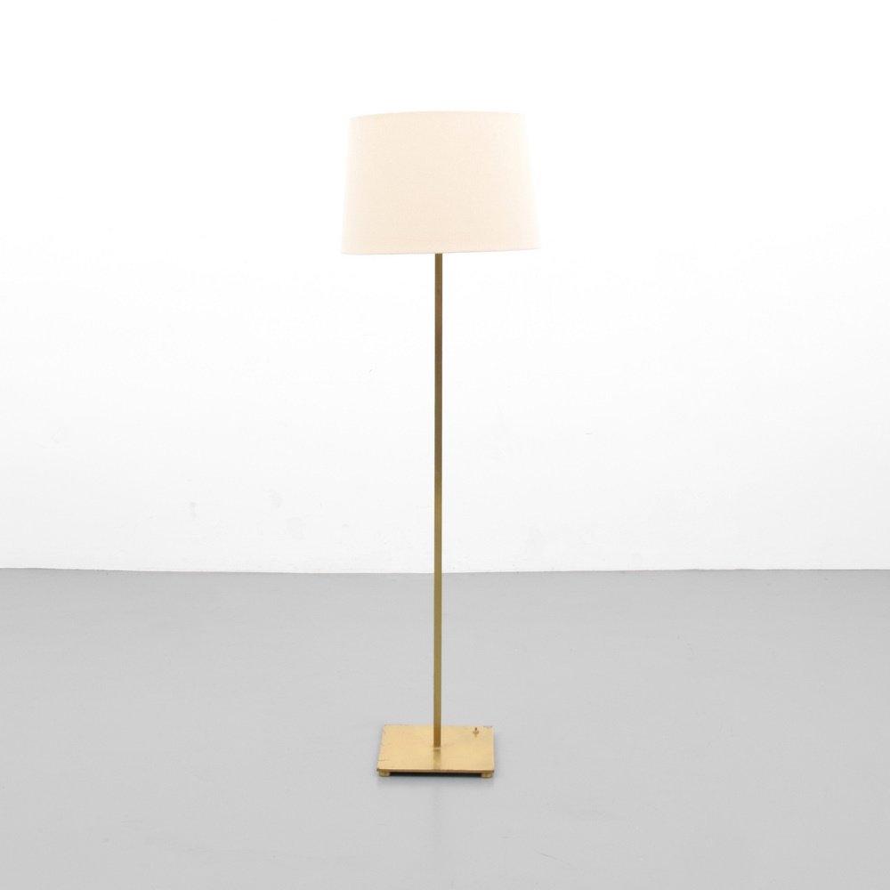 T.H. Robsjohn-Gibbings Floor Lamp: Designer & Manufacturer: T.H. Robsjohn Gibbings; Hansen Markings: marking(s) Country of Origin & Materials: USA; brass, shade Additional Information: Lamp has two light sockets. (Key Word Search: Bake