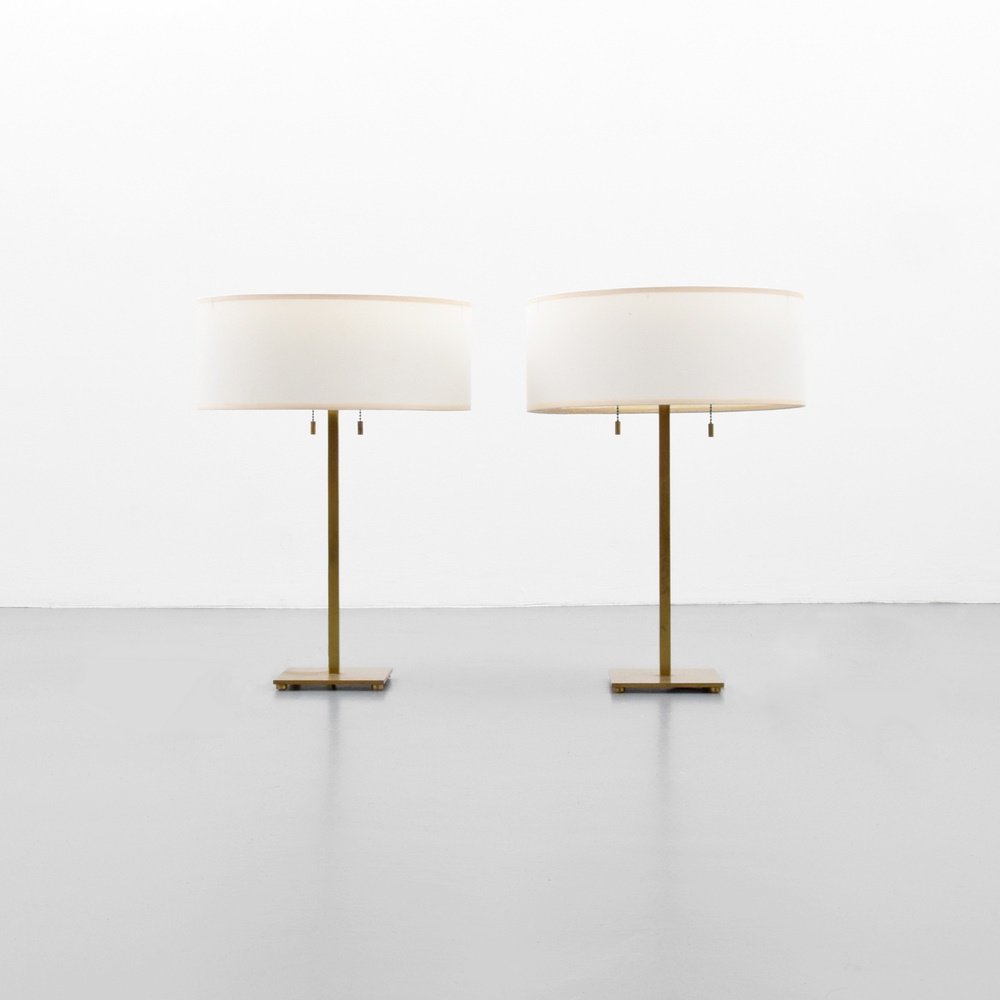 Pair of T.H. Robsjohn Gibbings Lamps: Designer & Manufacturer: T.H. Robsjohn Gibbings; Hansen Markings: marking(s) Country of Origin & Materials: USA; brass, shade Additional Information: Each lamp has two light sockets. (Key Word Search: