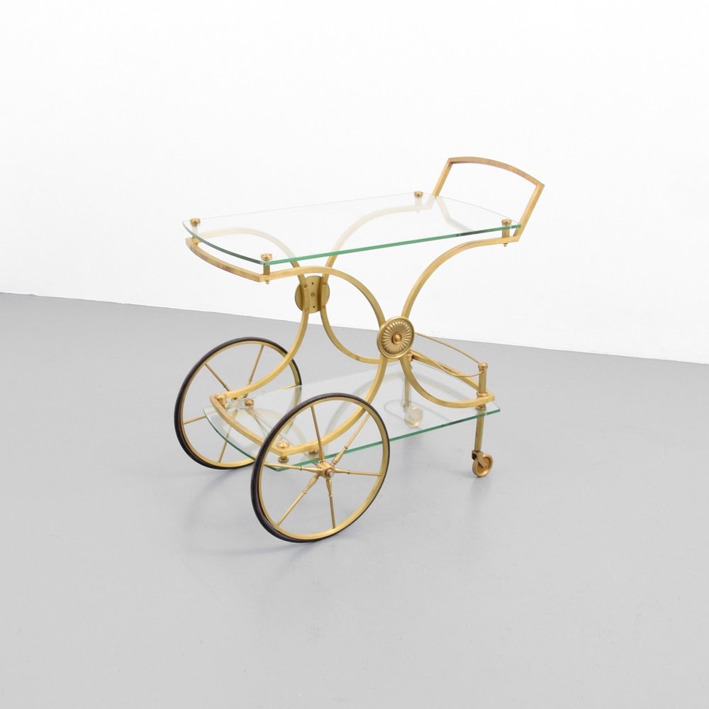 French Wheeled Bar Cart: Designer & Manufacturer: unknown Markings: no marking(s) apparent Country of Origin & Materials: France; brass, glass Additional Information: (Key Word Search: Maison Bagues / Charles, Mategot, Jean R