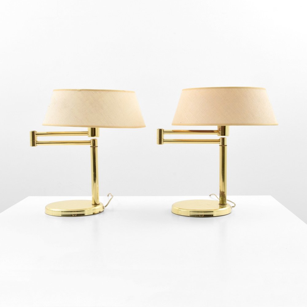 Pair of Walter Von Nessen Swing-Arm Lamps: Designer & Manufacturer: Walter Von Nessen; Nessen Studio Markings: marking(s) Country of Origin & Materials: USA; brass, shade Additional Information: (Key Word Search: James Mont, Serge Roche, Karl