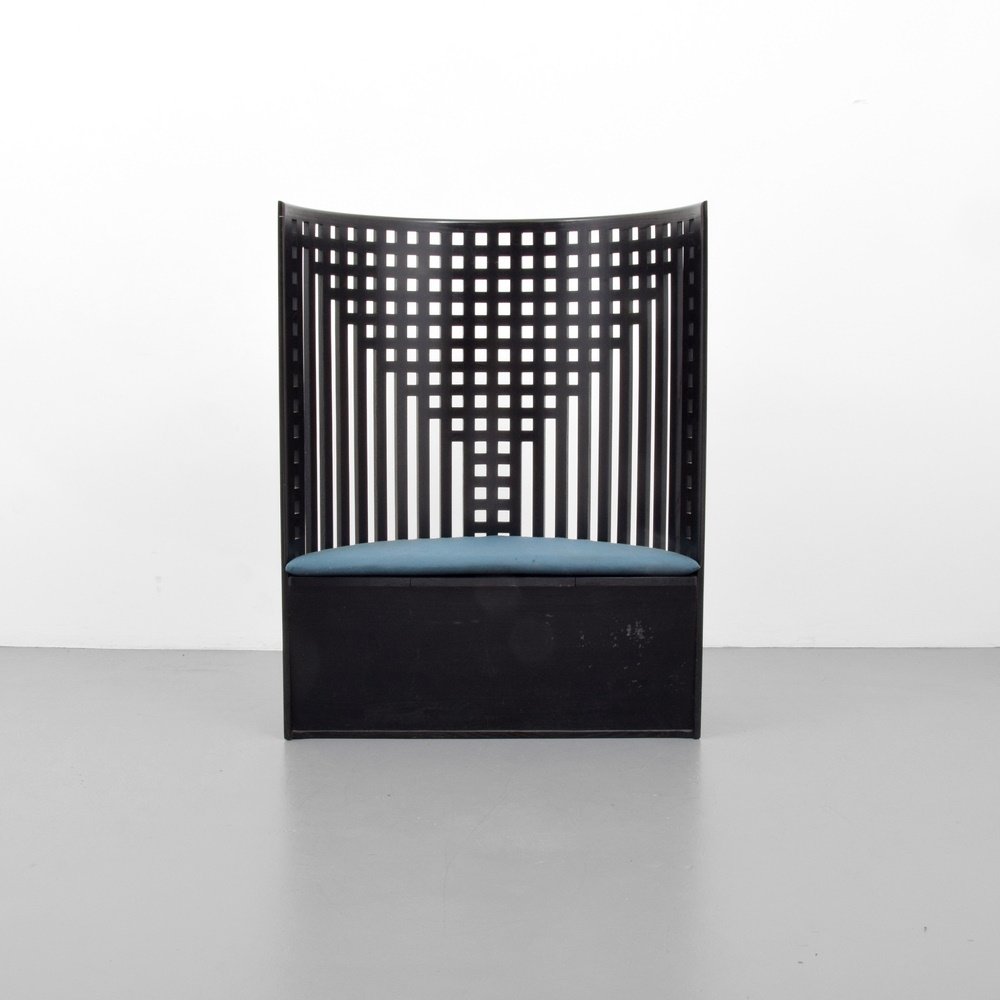 Charles Rennie Mackintosh (After) Lounge Chair: Designer & Manufacturer: Charles Rennie Mackintosh (After); Cassina Markings: marking(s) Country of Origin & Materials: Italy; ebonized oak, upholstery Additional Information: Chair is known as the WI