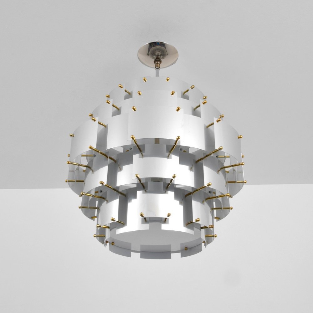 Large Chandelier Attributed to Robert Sonneman: Designer & Manufacturer: Robert Sonneman, Attributed Markings: no marking(s) apparent Country of Origin & Materials: USA; chromed metal, brass, plastic Additional Information: Chandelier has three lig