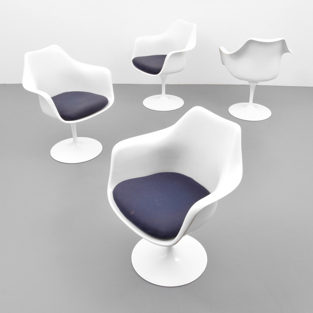 Eero Saarinen TULIP Arm Chairs, Set of 4: Designer & Manufacturer: Eero Saarinen; Knoll International Markings: no marking(s) apparent Country of Origin & Materials: USA; plastic, upholstery, aluminum Additional Information: Chairs are the PE