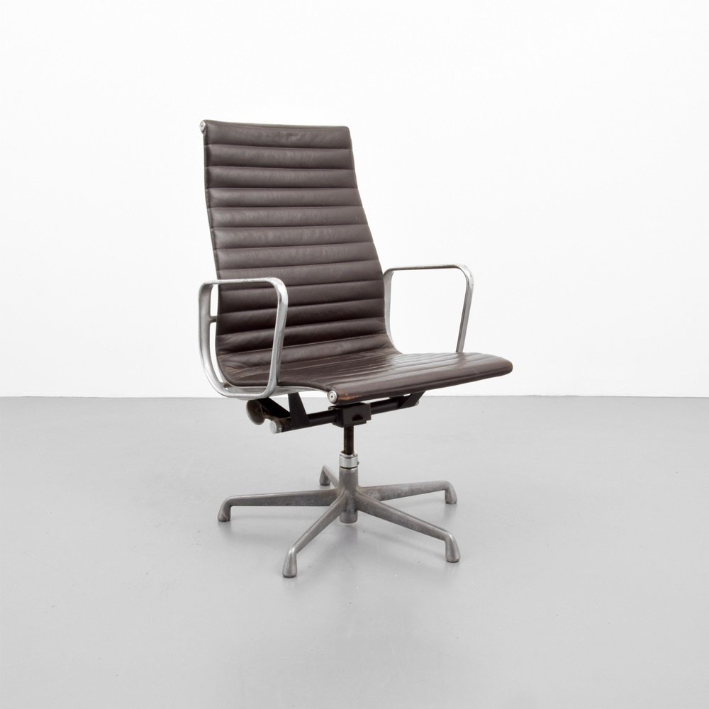 Charles & Ray Eames ALUMINUM GROUP Chair: Designer & Manufacturer: Charles & Ray Eames; Herman Miller Markings: marking(s) Country of Origin & Materials: USA; leather, aluminum Additional Information: Reference (various versions): Classic Her
