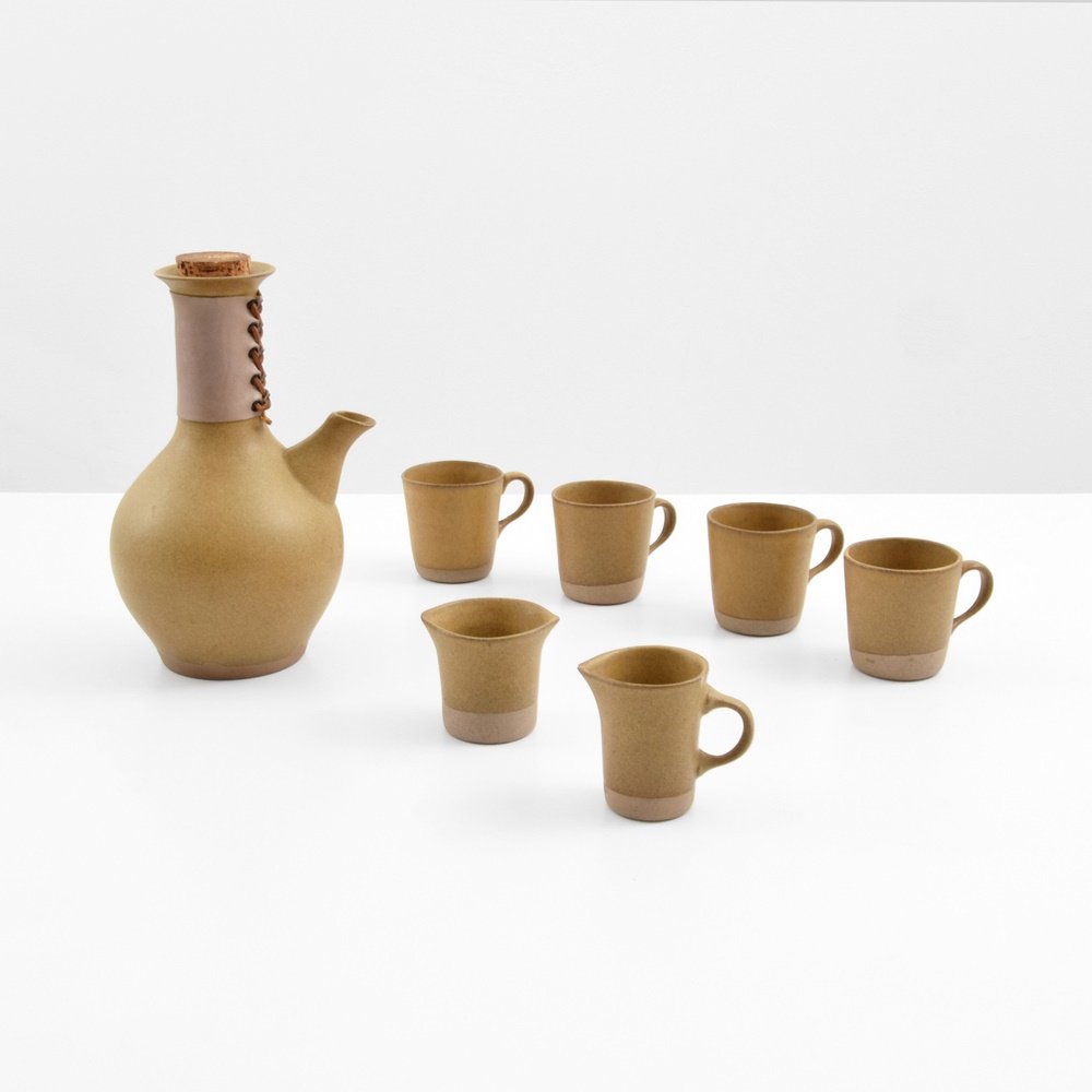 Gordon & Jane Martz Coffee Set: Designer & Manufacturer: Gordon & Jane Martz Markings: marking(s) Country of Origin & Materials: USA; pottery, leather, cork Additional Information: (Key Word Search: Bitossi, Claude Conover, Marcello