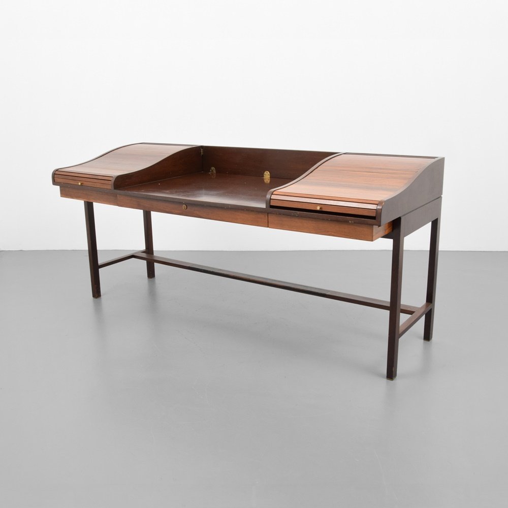 Edward Wormley Executive Roll-Top Desk: Designer & Manufacturer: Edward Wormley; Dunbar Markings: marking(s) Country of Origin & Materials: USA; walnut, rosewood, leather, brass Additional Information: Desk is model #912C. Desk has three dr