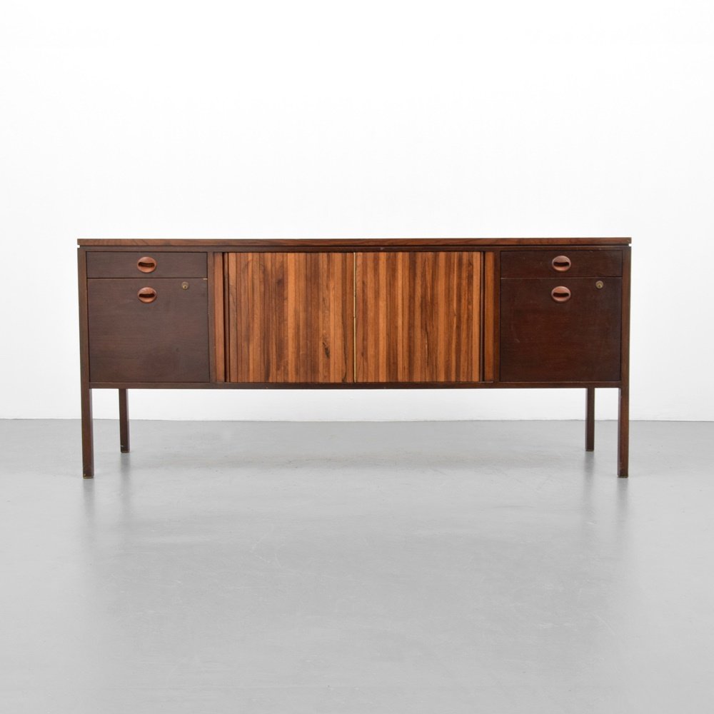 Edward Wormley Cabinet: Designer & Manufacturer: Edward Wormley; Dunbar Markings: marking(s) Country of Origin & Materials: USA; rosewood, wood, brass Additional Information: Cabinet has two drawers, two file drawers, and tw