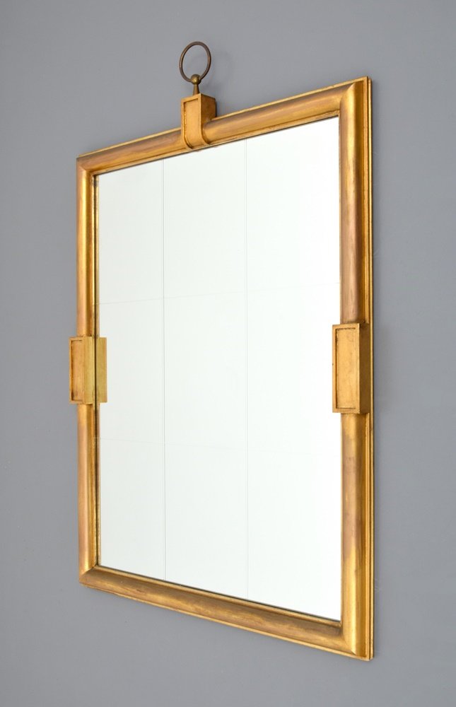 Large Tommi Parzinger Mirror: Designer & Manufacturer: Tommi Parzinger; Parzinger Originals Markings: no marking(s) apparent Country of Origin & Materials: USA; wood, brass, mirror Additional Information: (Key Word Search: James M