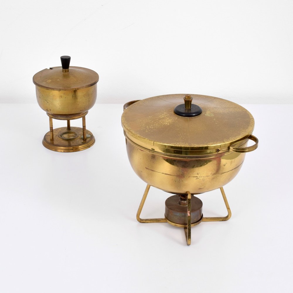 Tommi Parzinger Chafing Dishes, Lot of 2: Designer & Manufacturer: Tommi Parzinger; Dorlyn Silversmiths Markings: marking(s) Country of Origin & Materials: USA; brass, other Additional Information: Set includes two lidded chafing dishes and a