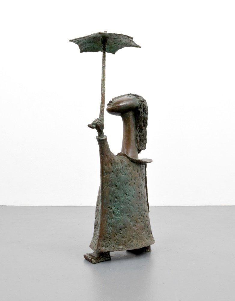 Massive Ángel Botello Bronze Sculpture, Signed Edition: Designer & Manufacturer: Ángel Botello (1913 - 1986) Markings: signed; ed. 9/10 Country of Origin & Materials: Puerto Rican; bronze Additional Information: Work is titled GIRL STANDING WITH UMBRELLA.
