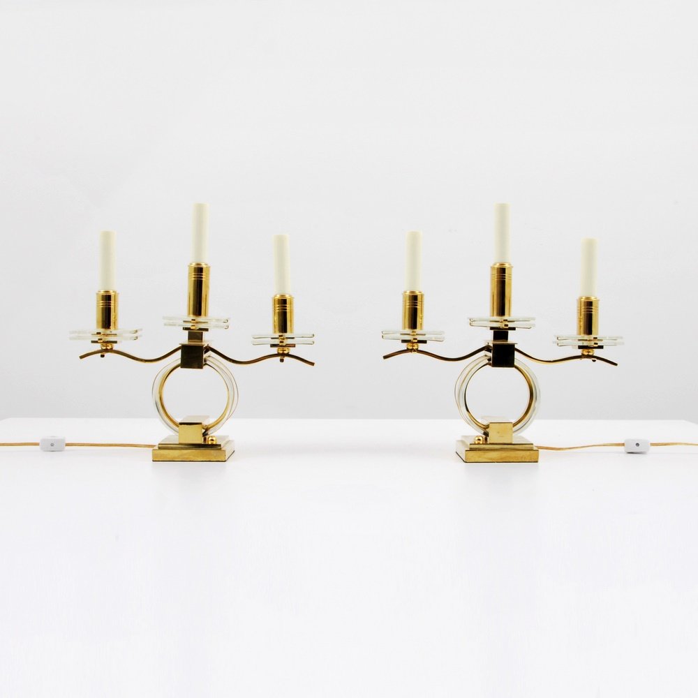 Pair of Marius-Ernest Sabino Lit Candelabra: Designer & Manufacturer: Marius-Ernest Sabino; Sabino Markings: marking(s) Country of Origin & Materials: France; brass, glass, Lucite Additional Information: (Key Word Search: James Mont, Serge Roche