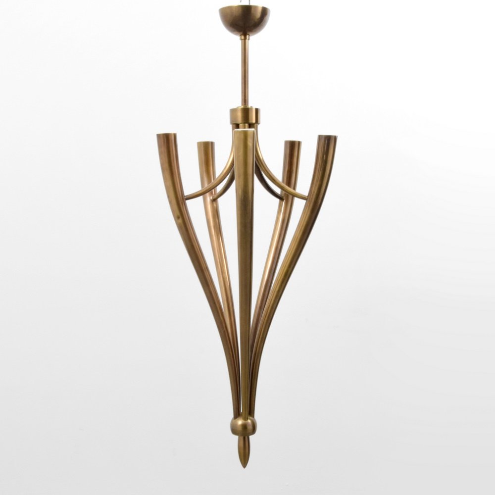 Large Guglielmo Ulrich Chandelier: Designer & Manufacturer: Guglielmo Ulrich Markings: no marking(s) apparent Country of Origin & Materials: Italy; metal Additional Information: Chandelier has five light sockets. (Key Word Search: 