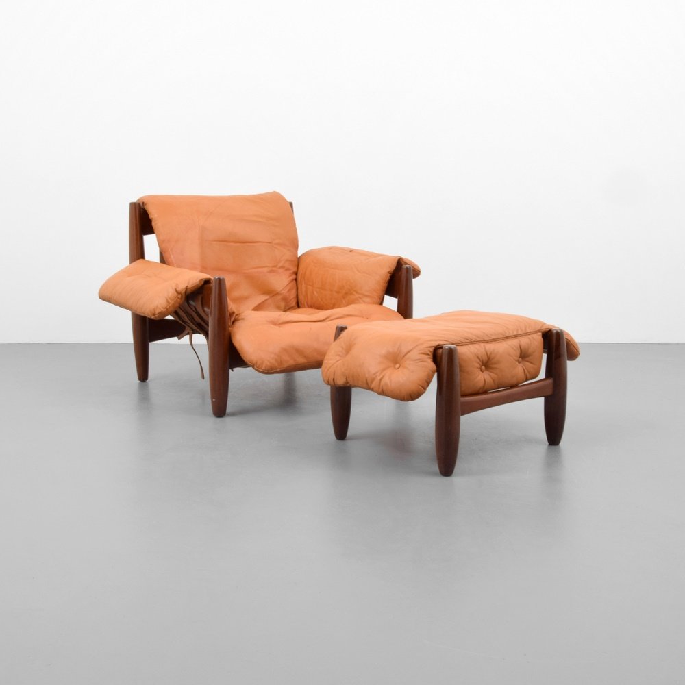Sergio Rodrigues MISCHIEVOUS Lounge Chair & Ottoman: Designer & Manufacturer: Sergio Rodrigues; Poltrona Moleca Markings: no marking(s) apparent Country of Origin & Materials: Brazil; leather, rosewood Additional Information: Reference: Sergio Rodrigues