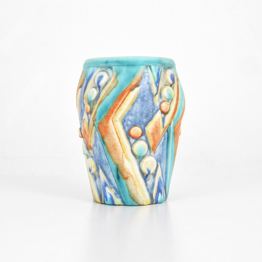 Clarice Cliff SGRAFFITO Vase: Designer & Manufacturer: Clarice Cliff Markings: marking(s) Country of Origin & Materials: England; pottery Additional Information: Pattern is SGRAFFITO. Dimensions(H,W,D): 9"h, 7"dia.