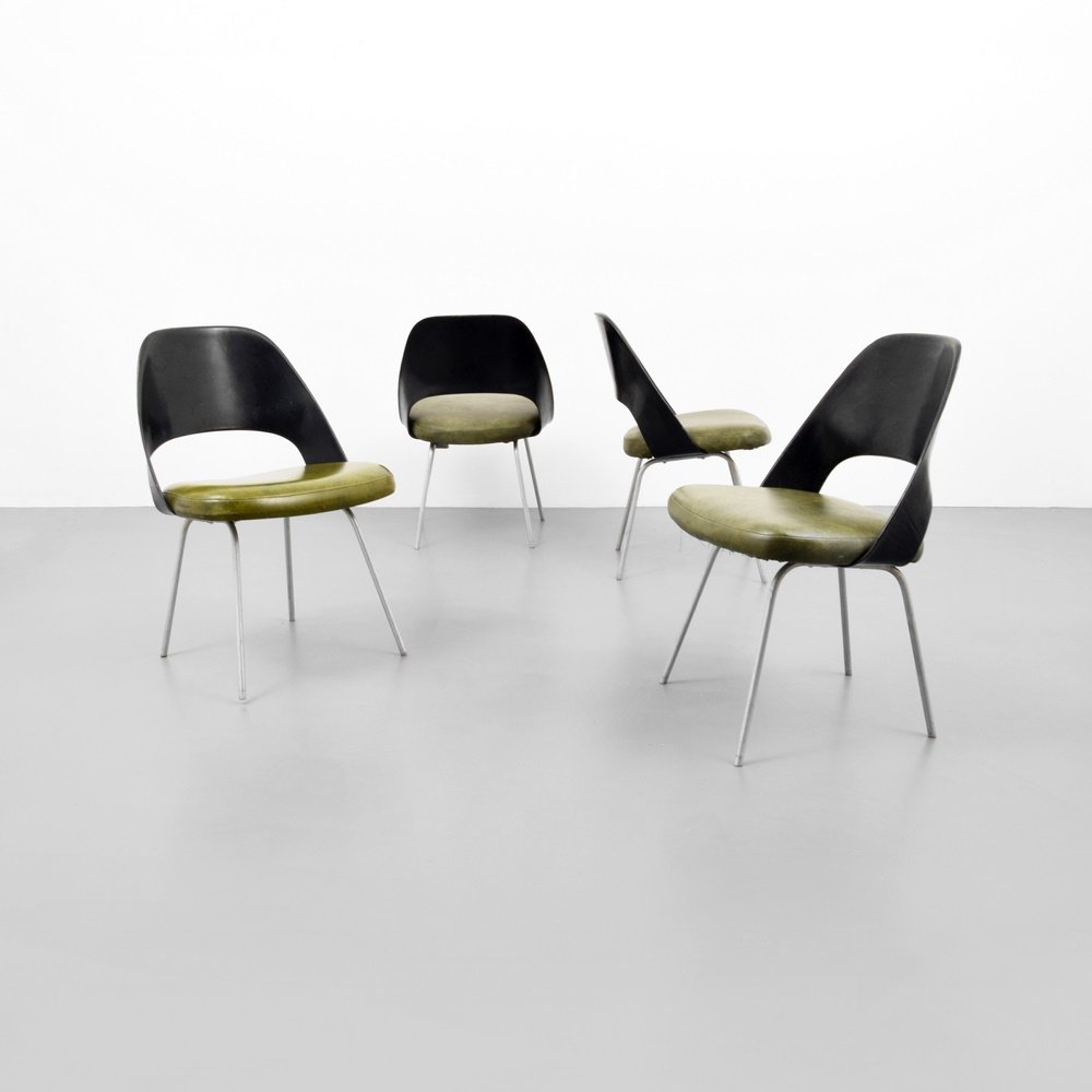 Early Eero Saarinen Dining Chairs, Set of 4: Designer & Manufacturer: Eero Saarinen; Knoll International Markings: marking(s) Country of Origin & Materials: USA; wood, metal, upholstery Additional Information: Chairs are model #72 PSB-1. Referen