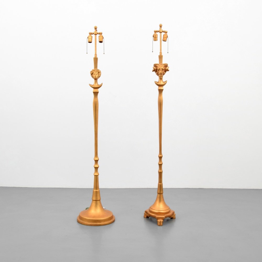 Pair of Sirmos Floor Lamps: Designer & Manufacturer :Sirmos Markings: Sirmos label Country of Origin & Materials: USA; metal, other (resin/plaster) Additional Information & Circa: Dimensions: 61.5"h, 12"dia.; 62.5"h, 10.5"dia.