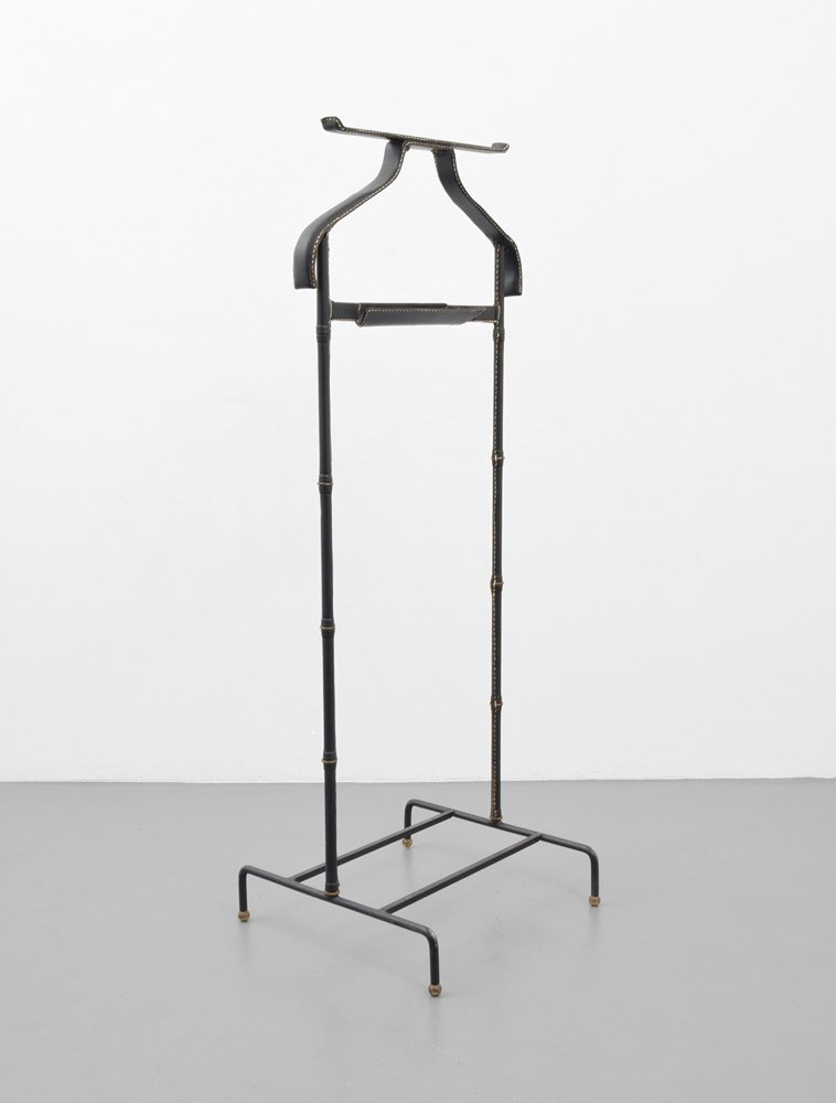 Jacques Adnet Valet: Designer & Manufacturer :Jacques Adnet Markings: no marking(s) apparent Country of Origin & Materials: France; brass, metal, saddle-stitched leather Additional Information & Circa: Provenance: Atomic