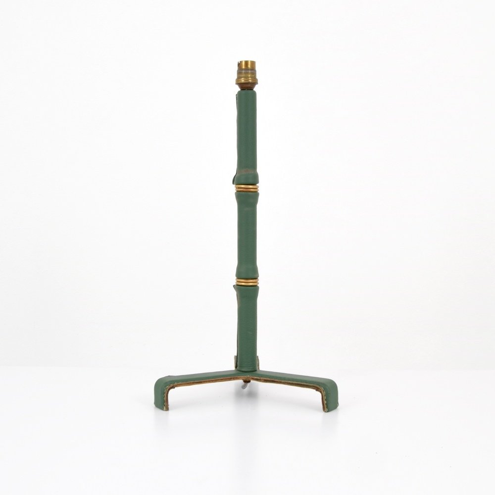 Jacques Adnet Lamp: Designer & Manufacturer :Jacques Adnet Markings: no marking(s) apparent Country of Origin & Materials: France; brass, saddle-stitched leather Additional Information & Circa: Provenance: Atomic Antique