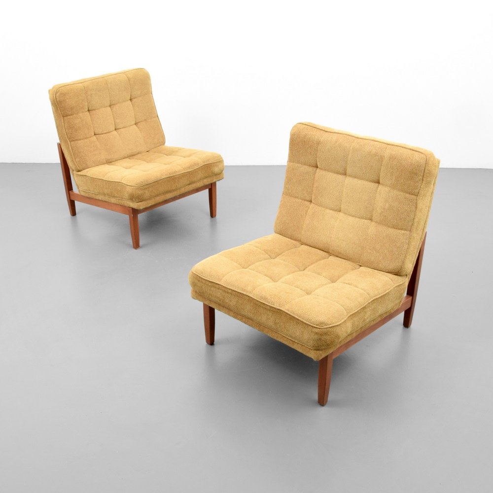 Pair of Florence Knoll Lounge Chairs: Designer & Manufacturer :Florence Knoll; Knoll International Markings: Knoll International label Country of Origin & Materials: USA; wood, upholstery Additional Information & Circa: Dimensions: 31"h, 