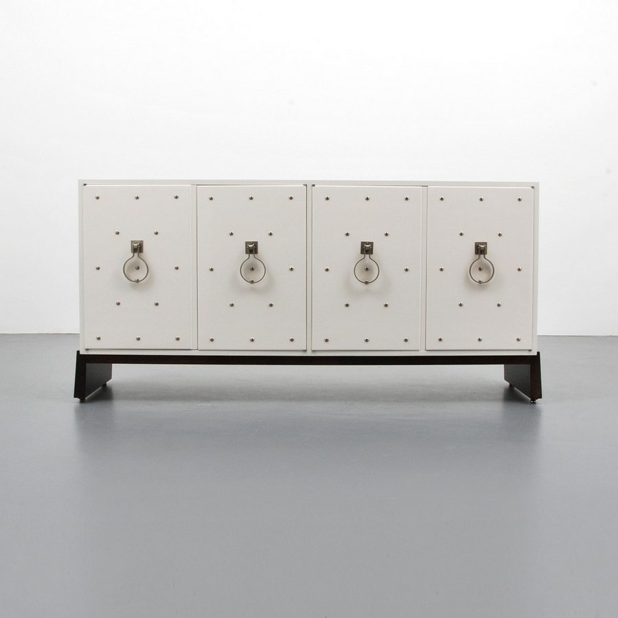 Tommi Parzinger Silver Studded Cabinet: Designer & Manufacturer: Tommi Parzinger; Parzinger Originals Markings: no marking(s) apparent Country of Origin & Materials: USA; wood, metal Additional Information & Circa: Cabinet has two pairs of 
