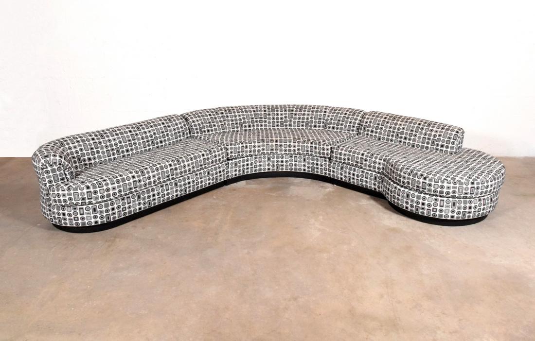 Large Sectional Sofa Attributed to Vladimir Kagan: Designer & Manufacturer: Vladimir Kagan, attributed; Directional Markings: Directional label Country of Origin & Materials: USA; wood, upholstery, leather-covered base Additional Information: No addit