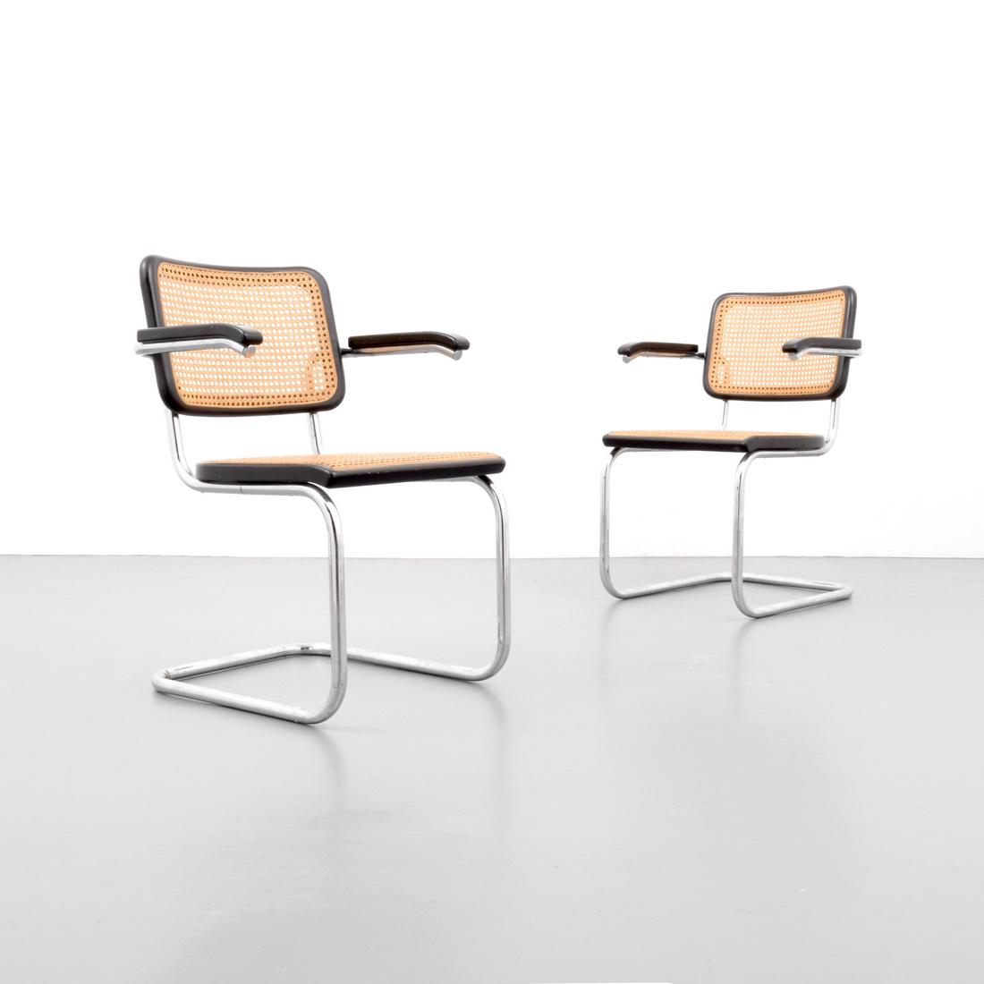 Pair of Marcel Breuer B-64 CANTILEVER Arm Chairs: Designer & Manufacturer: Marcel Breuer; Thonet Markings: Thonet label Country of Origin & Materials: USA; chromed steel, beech wood, wicker Additional Information: No additional information. Dimension