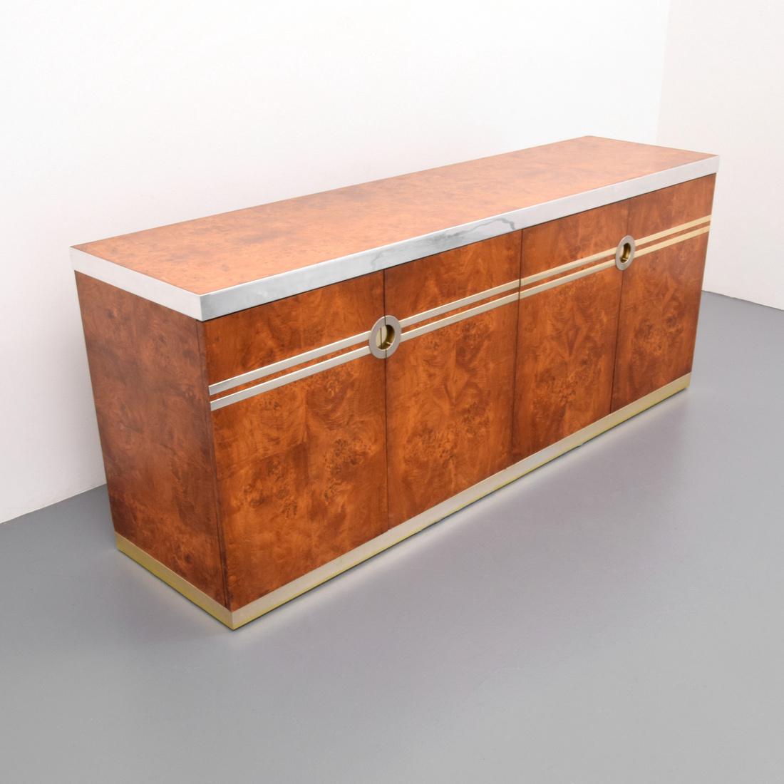 Pierre Cardin Cabinet: Designer & Manufacturer: Pierre Cardin Markings: signed Country of Origin & Materials: France; burl maple, brass Additional Information: Two doors reveal two drawers and a single shelf, the other pair