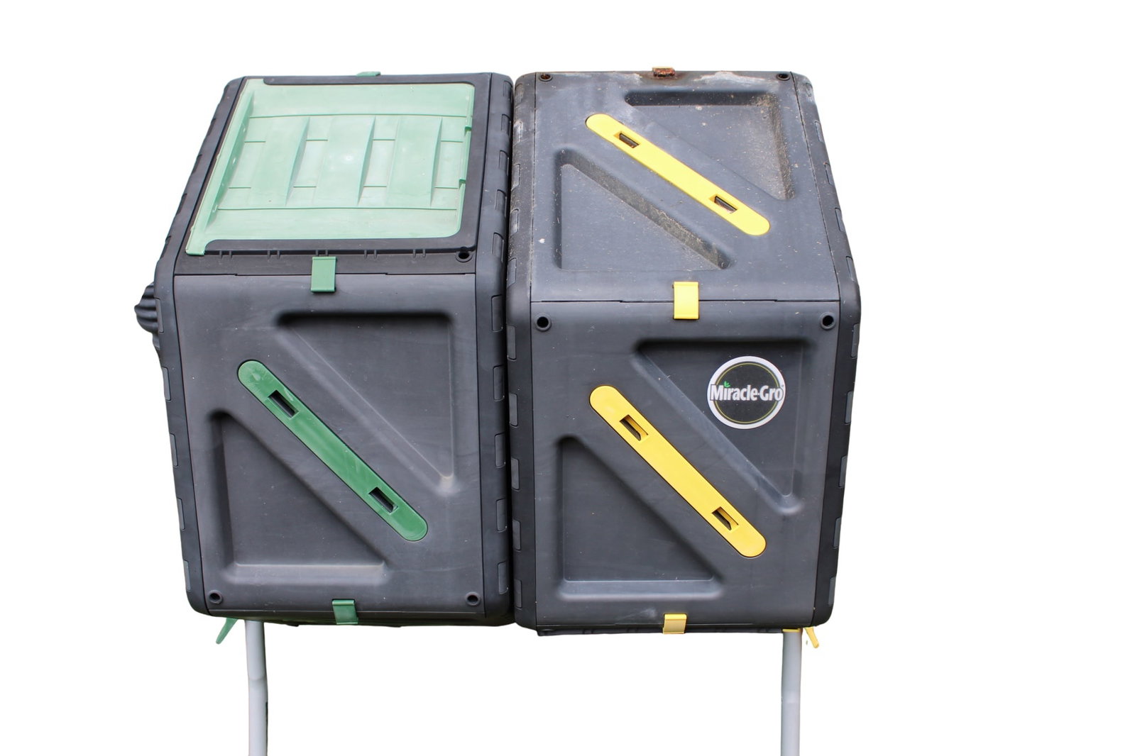 Miracle Gro Dual Chamber Compost Tumbler: Miracle Gro Dual Chamber Compost Tumbler. Easy Turn, Heavy Duty Outdoor Bin Composter with Two Sliding Doors. Two 18.5 Gallon Chambers. 30" H x 24.5" W x 23.5" D.