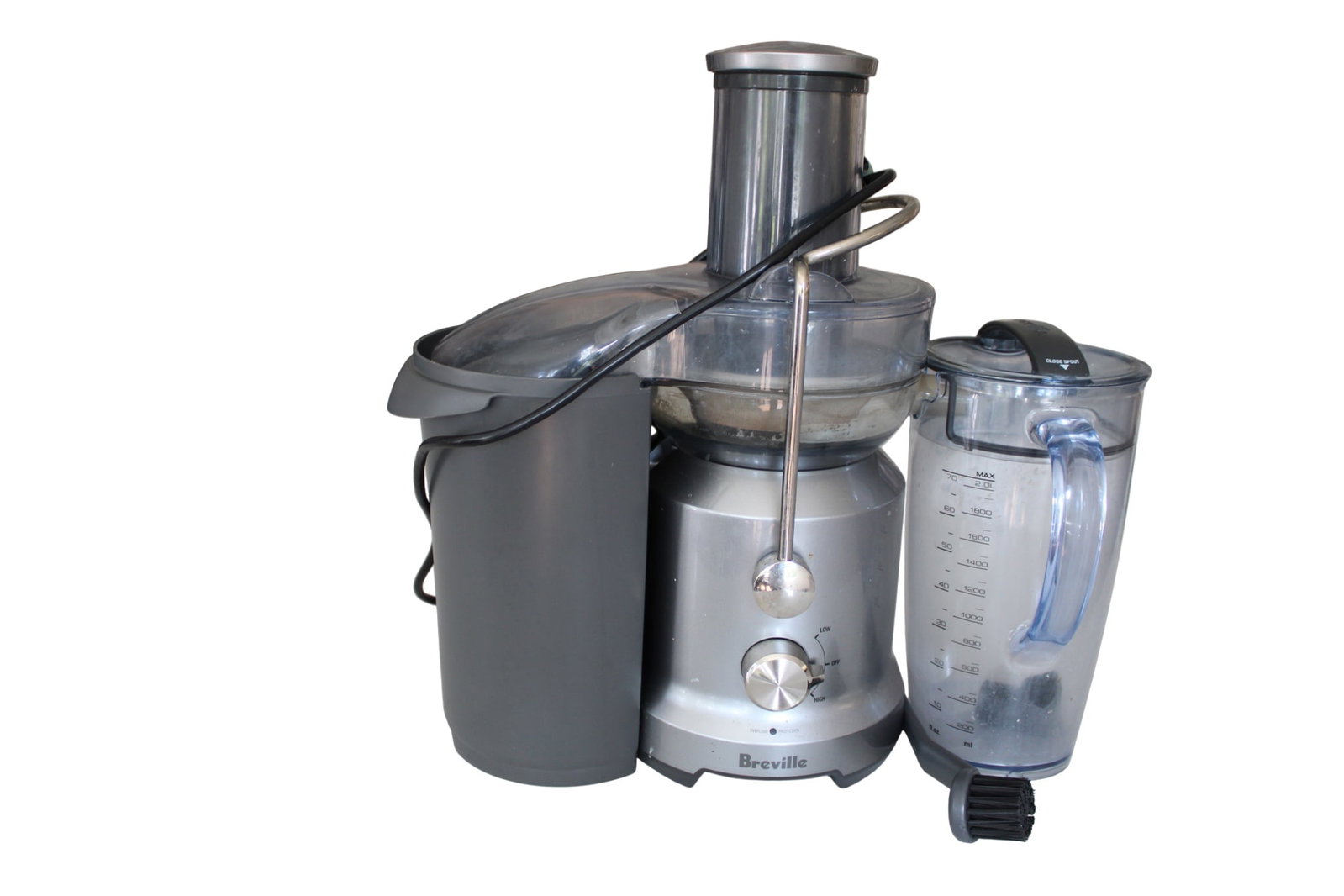 Breville Juicer: Breville Juicer. Includes Pitcher and Cleaning Brush. 17" H x 13" W x 8.5" D.