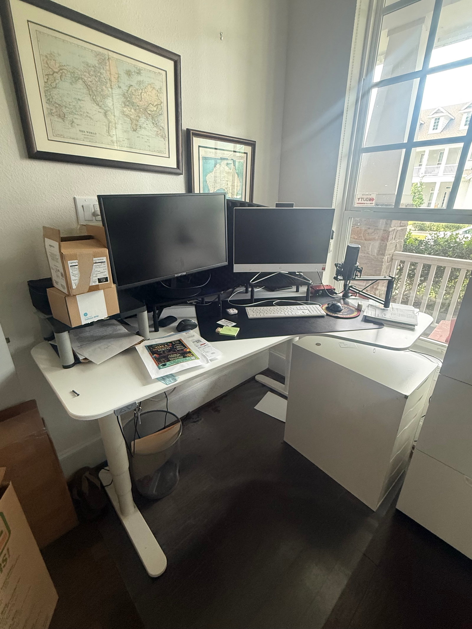 White Motorized Desk: White Motorized Desk. Second Photo Shows the Buttons for Raising and Lowering. 24" H x 65" W x 36" D.