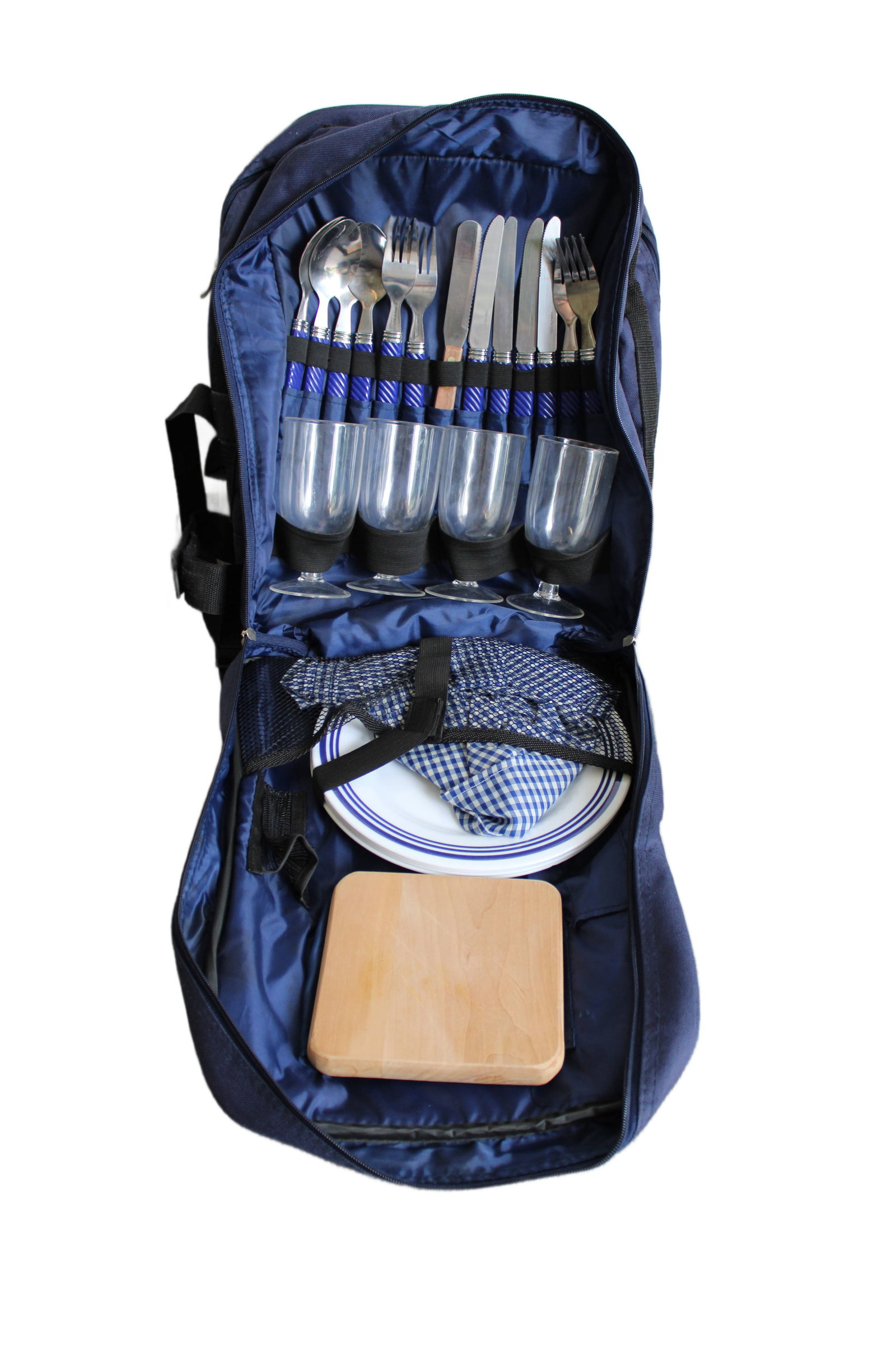 Picnic Backpack with Four Place Settings: Navy Blue Mobil Picnic Backpack with Four Place Settings. Each Setting Includes: Napkin, Plate, Fork, Spoon, Knife, Plastic Stemmed Goblet. Cutting Board with Knife Also Included. 17" H x 13" W x 3"