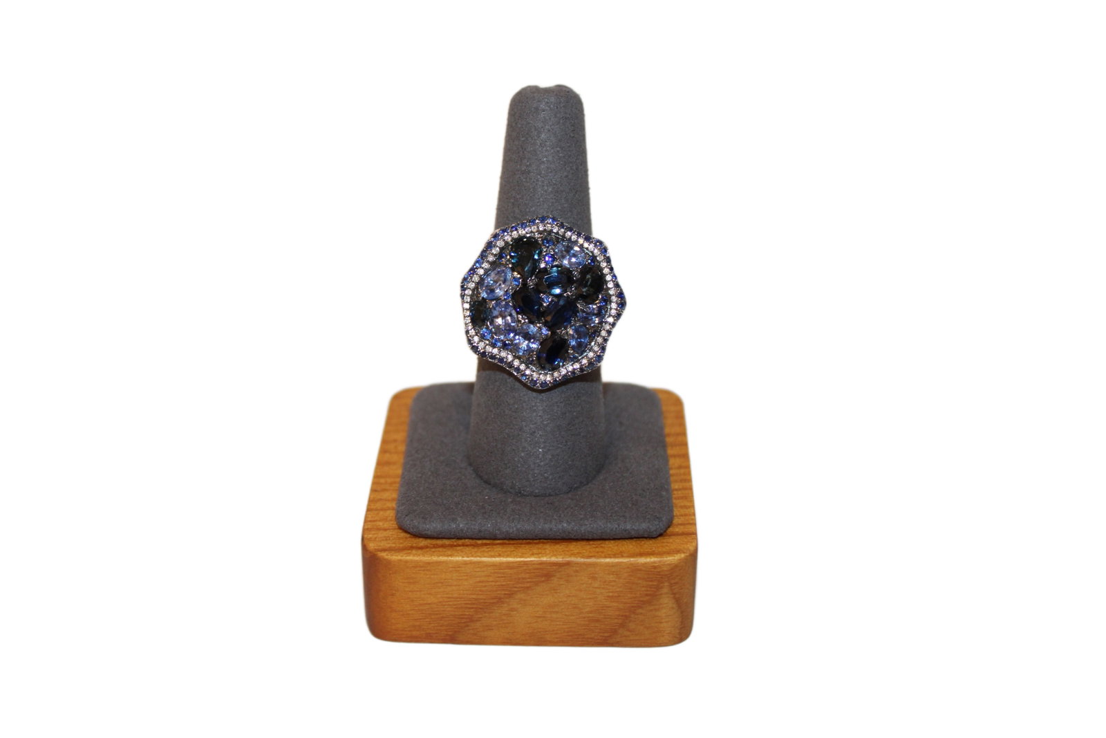 Ladies 18K White Gold Blue Sapphire and Diamond Ring: Ladies 18K White Gold Ring with 6 Oval Thai Sapphires, 1 Pear Shaped Sapphire, 4 Pear Shaped Ceylon Sapphires, 60 Matching Diamonds and 63 Round Matching Thai Sapphires. Diamonds .21 Carats Round