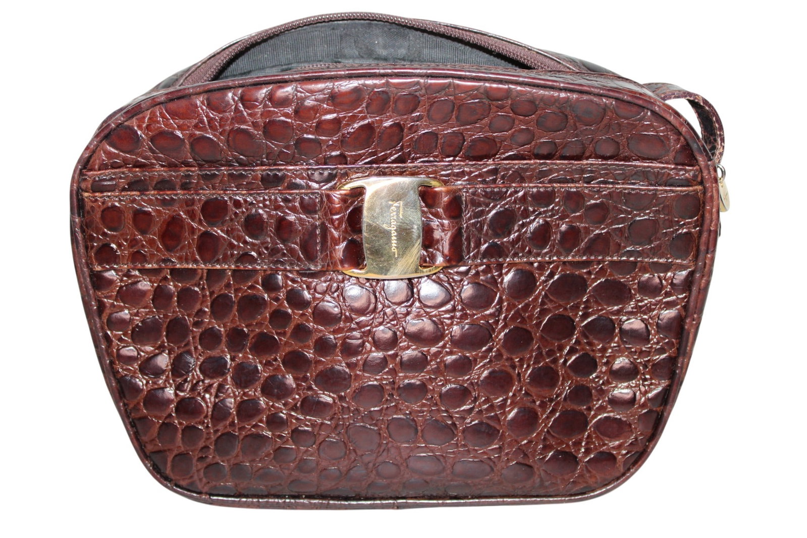 Salvatore Ferragamo Brown Leather Crossbody Purse: Salvatore Ferragamo Brown Leather Crossbody Purse. One Interior Zipper Pocket. One Exterior Pocket. 7.75” H x 10” W.