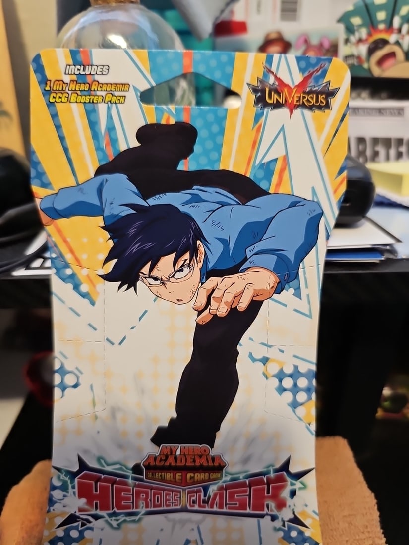 My Hero Academia UniVersus Heroes Clash Booster Pack 10 Cards: Dive into the action-packed world of My Hero Academia with the Heroes Clash Card Pack, featuring 10 collectible cards from Jasco Games. Each pack contains a mix of powerful heroes like All Might,