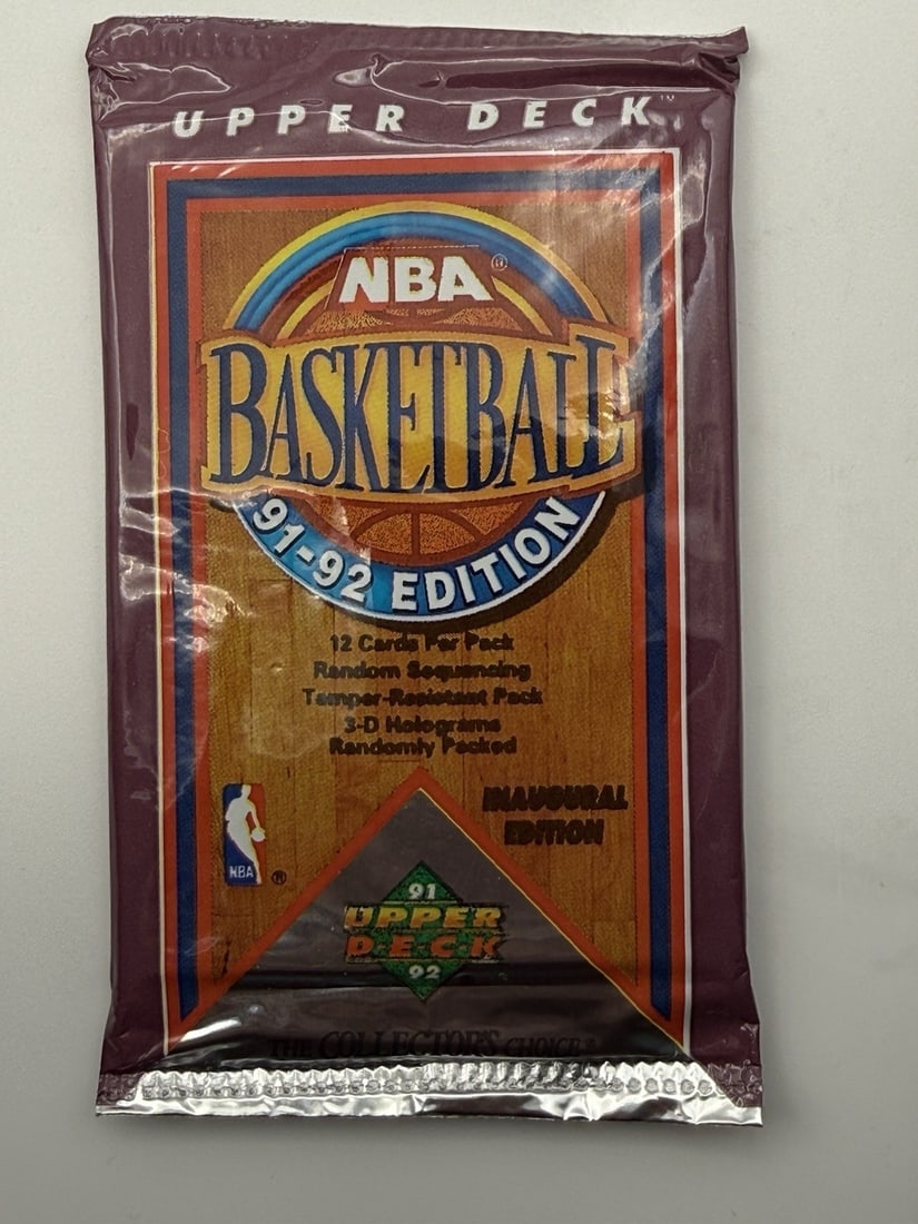 1991-92 Upper Deck NBA Basketball Factory Sealed Wax Pack 12 cards: The product is a sealed pack of 1991-92 Upper Deck NBA basketball trading cards, featuring cards from teams such as the Indiana Pacers, Chicago Bulls, Atlanta Hawks, and Los Angeles Lakers. This vinta
