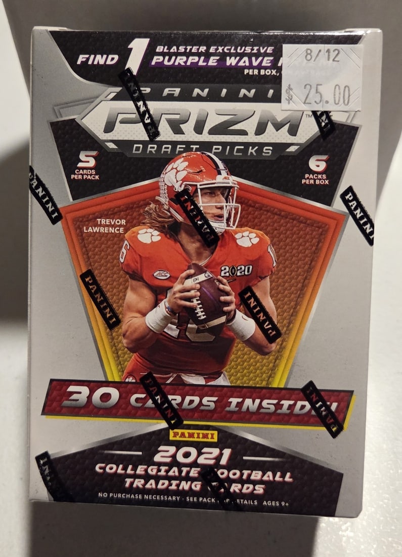 2021 Panini Prizm Draft Picks Football Blaster Box Exclusives Purple Wave: The 2021 Panini Prizm Draft Picks Football Blaster Boxes offer exclusive Purple Wave parallel cards, featuring top NFL players like Joe Burrow, Trevor Lawrence, and Patrick Mahomes. Each box contains