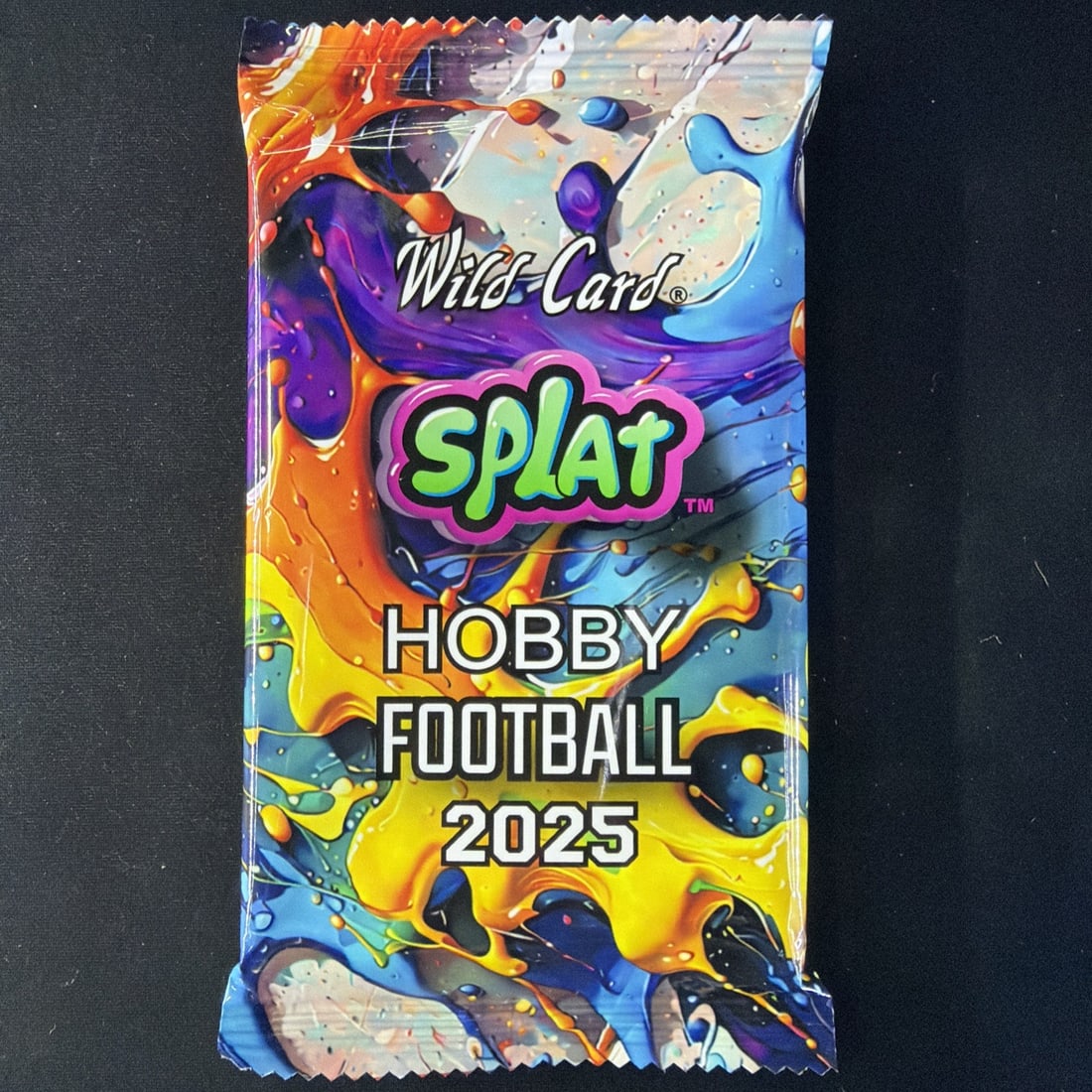Wild Card Splat Football 2025 Hobby Sports Trading Card Pack: The popular SPLAT line returns in 2025 Wild Card SPLAT Hobby Football, bringing bold artwork and strong rookie potential to football collectors.Highlights: 2025 Hobby Football release Wild Card SPLAT