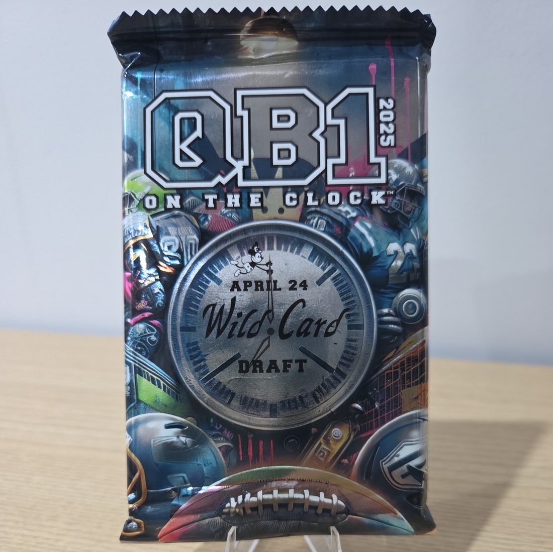 2025 Wild Card QB1 On The Clock draft Pack: The 2025 Wild Card QB1 On The Clock Pack is a factory sealed trading card set featuring exclusive autograph authentication by Donruss. This sports trading card pack is specifically dedicated to footba