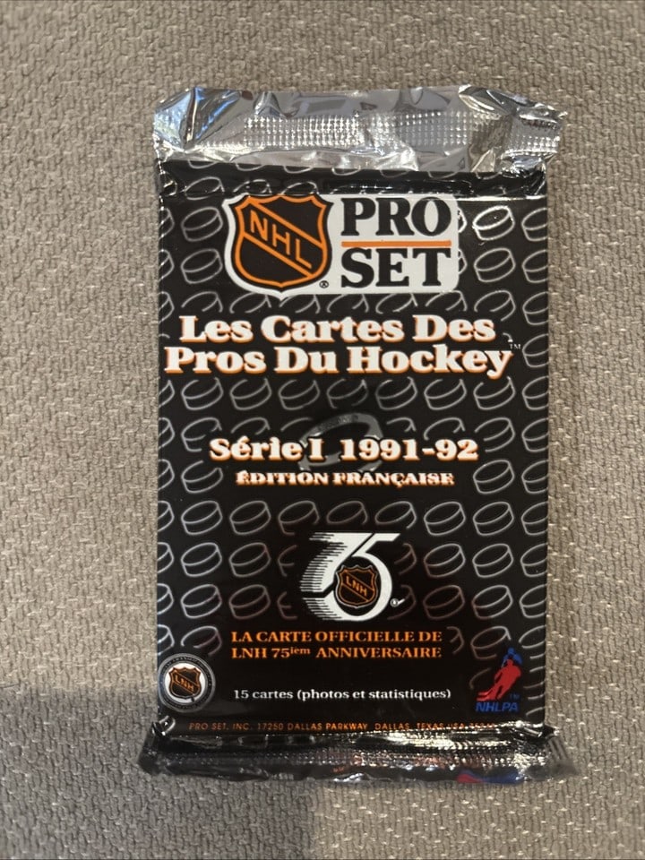 1991-92 NHL Pro Set Series Unopened Pack - French Edition: The product is an unopened packs of French Edition 1991-92 NHL Pro Set Series 1 trading cards. Each pack contains 15 standard-sized cards featuring players from the National Hockey League (NHL) for th